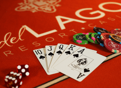 Cards, Dice and Chips on a del Lago Table Game Board